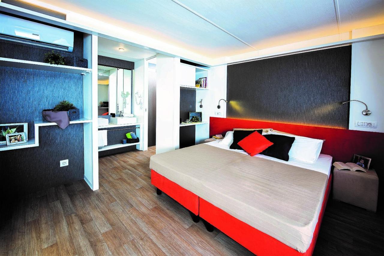 Villaggio Camping Torre Del Porticciolo Порто-Конте Екстер'єр фото