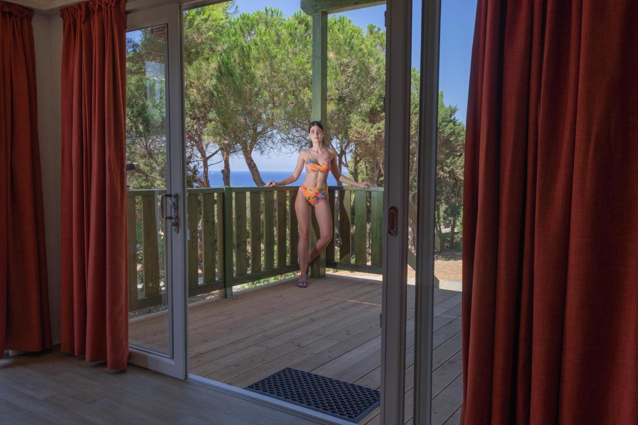 Villaggio Camping Torre Del Porticciolo Порто-Конте Екстер'єр фото