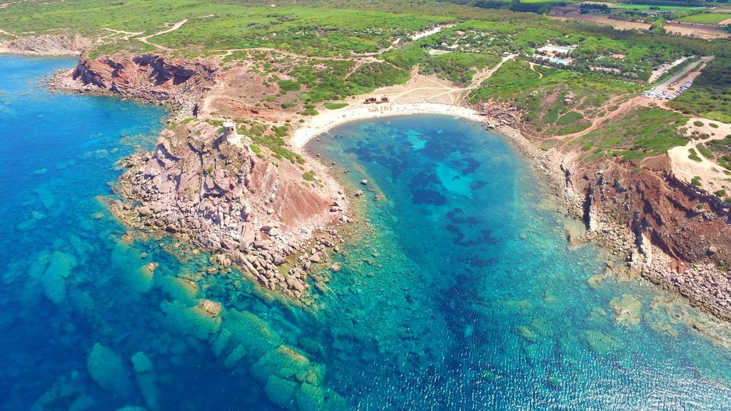 Villaggio Camping Torre Del Porticciolo Порто-Конте Екстер'єр фото